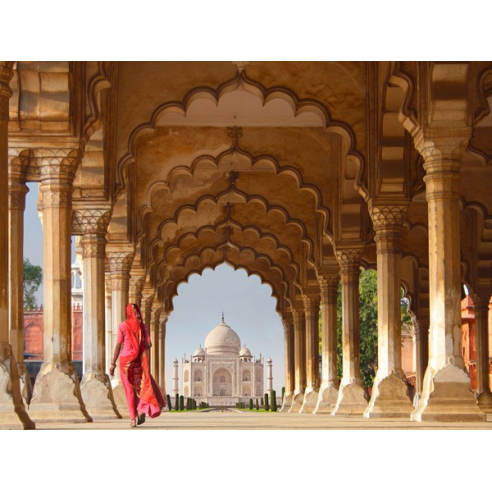 Woman in traditional Sari walking...